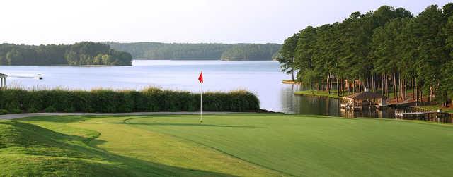 A view of a hole with water in background at Milledgeville Country Club