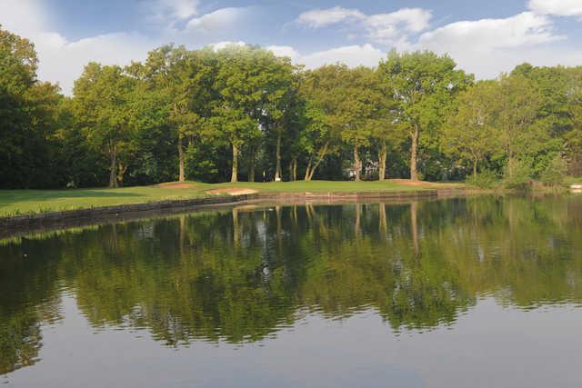 A view over the water of green #16 at Wanstead Golf Club