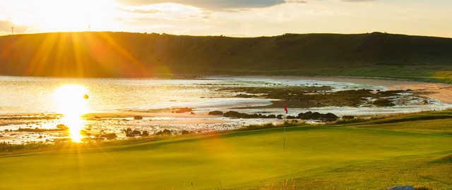 A sunny view of hole #11 at Golf House Club