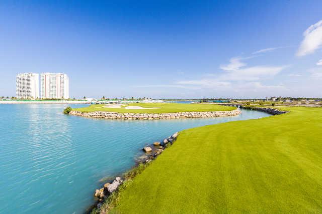 View of an island green at Puerto Cancun Golf Club