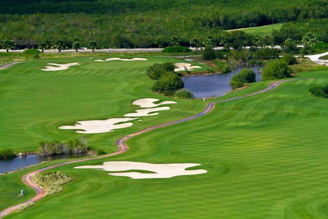 View of a fairway and green at Puerto Cancun Golf Club