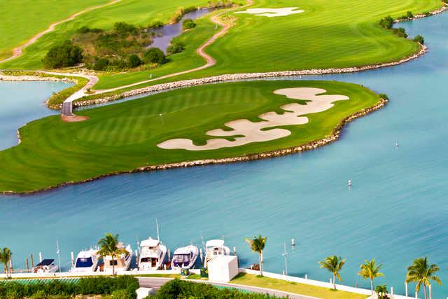 Aeria view of an island green at Puerto Cancun Golf Club