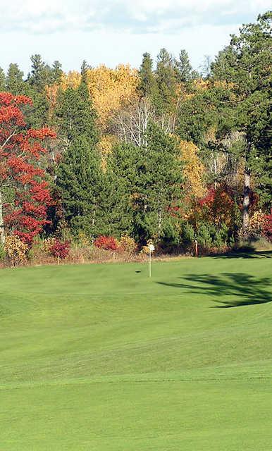 A fall day view of a hole at Blue Fox Run Golf Club