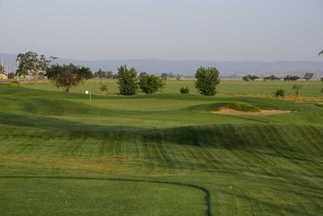 A view of hole #2 with bunker on the right at Wild Wings Golf Club