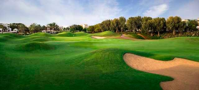 A view of a green at The Address Montgomerie Dubai Golf Resort + Spa