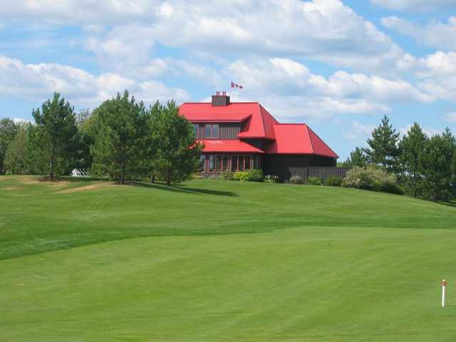 A view of the clubhouse from the 6th fairway at Diamond In The Ruff Golf Club