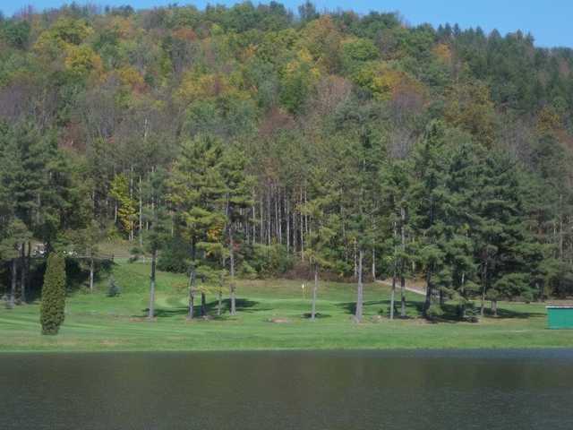 A view of a green with water coming into play at Corey Creek Golf Club
