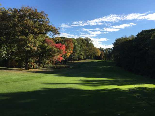 A fall day view from a tee at Lake Isle Country Club