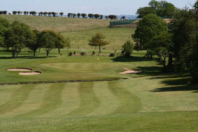 A view of green protected by sand traps at Ardeer Golf Club