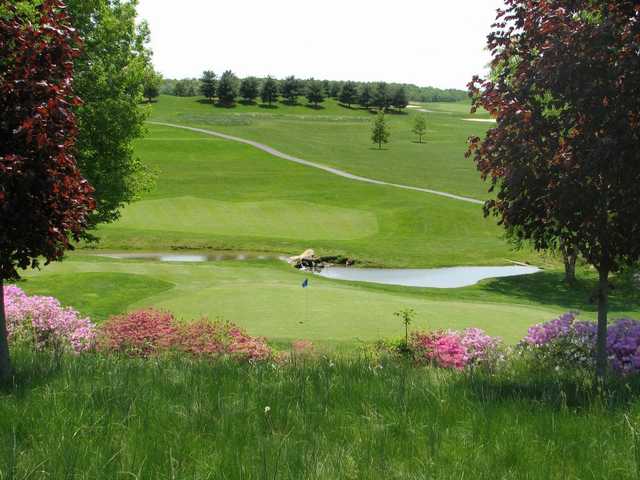 A view of green #8 with water coming into play at Pilgrim's Oak Golf Course