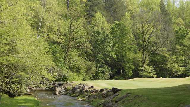 A view of a green with water coming into play at Bent Creek Golf Course
