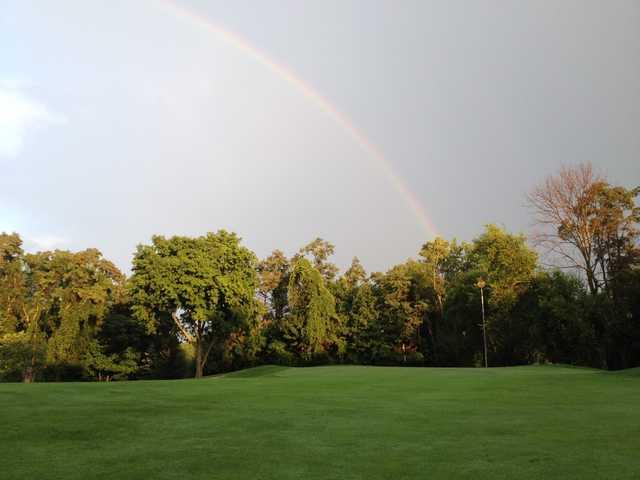 The rainbow over hole #14 at 3 Lakes Golf Course