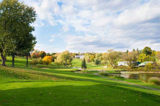 A fall day view of a hole from 3 Lakes Golf Course