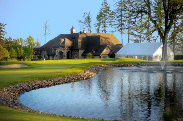 View of the practice green and clubhouse at Eagle Landing Golf Club