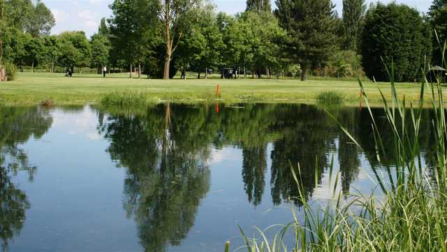 View of a green over water at Haverhill Golf Club