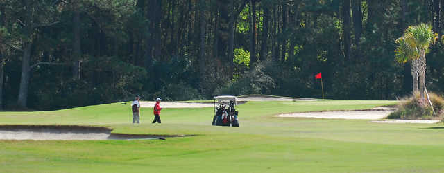 A sunny day view of a green at Jekyll Island Golf Club