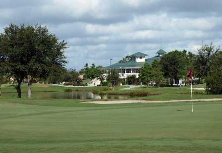 A view of green with clubhouse in background at The Preserve Golf Club