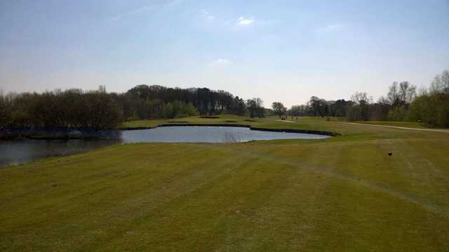 16th tee shot across the lake at Formby Hall Golf Club