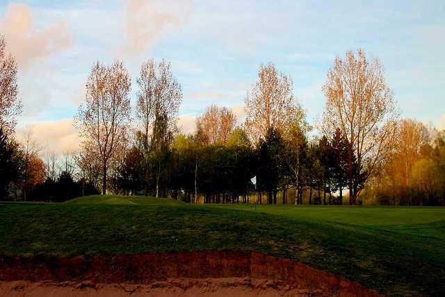 A view of the putting green from the bunker