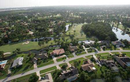 Aerial view of holes #14 & #15 at North Course from Pelican Bay Club