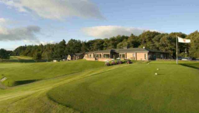1st hole with the clubhouse at West Linton Golf Club