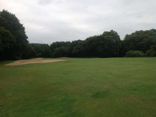 Approach to the bunker-guarded 1st green on the West Middlesex Golf Course