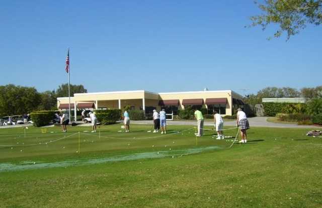 A view of the clubhouse and practice area at Serenoa Golf Club