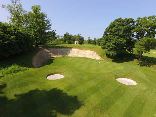 View of a green and bunker at Harleyford Golf Club