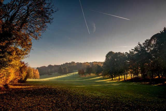 A fall day view of a fairway at Henley Golf Club