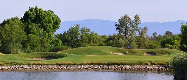 A view over the water of a hole at del Lago Golf Club.