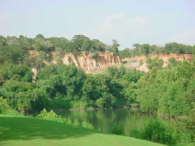 A view from tee #7 to the cliffs at Lost Pines Golf Course