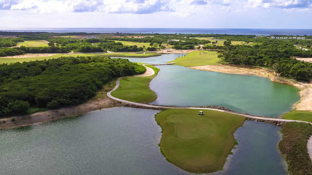 A view of a green surrounded by water at Ocean's 4 Golf