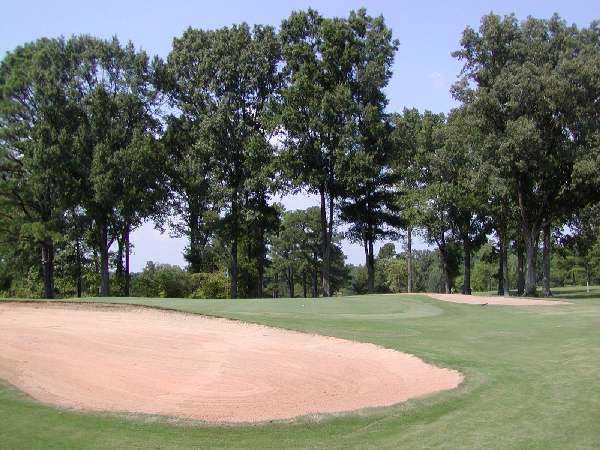 A view of the 3rd green with bunker in foreground at Star Fort Golf Club