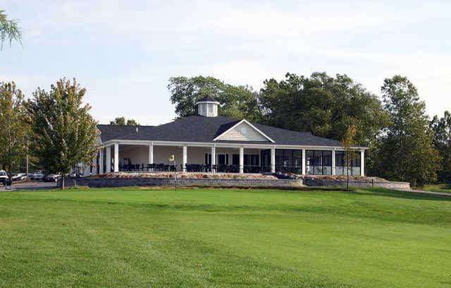 A view of a  green and the clubhouse at Heritage Hills Golf Course.