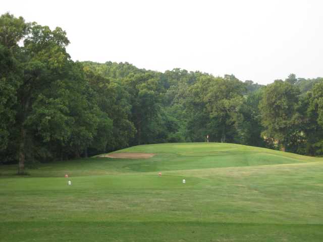A view of a tee and a green in the distance at Heritage Hills Golf Course.