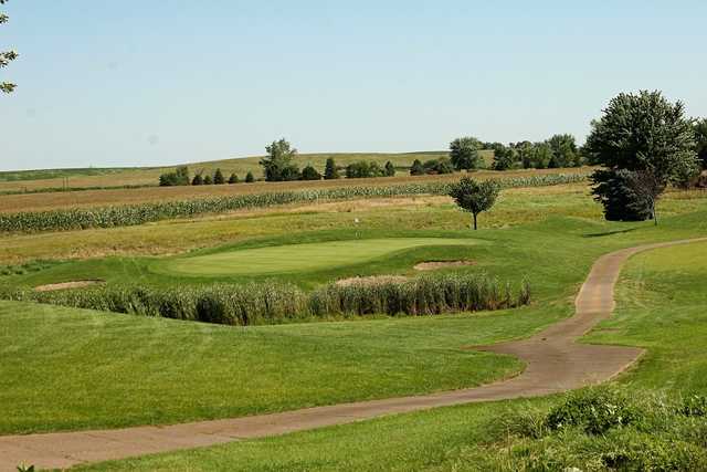 A view of a green protected by bunkers at Twin Creek Golf Club.