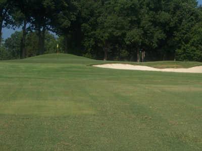 A view of green with bunker on the right at Spring Lake Country Club