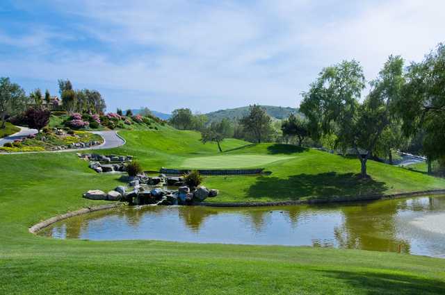 A view over the water of hole #9 at Twin Oaks Golf Course.