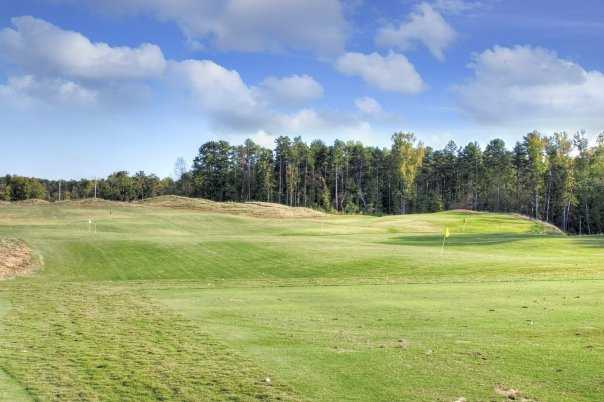A view of the driving range at Red Bridge Golf & Country Club