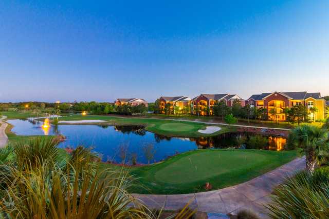 A view of a green and the practice putting area at The Nine at ONE CLUB.