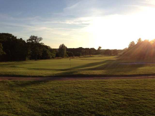 A sunny day view of a hole at Forest of Arden Country Club.