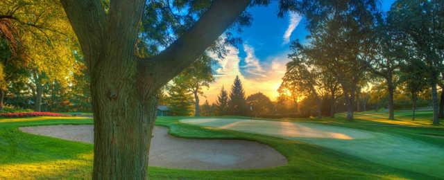 A sunny day view of a hole at Elgin Country Club.