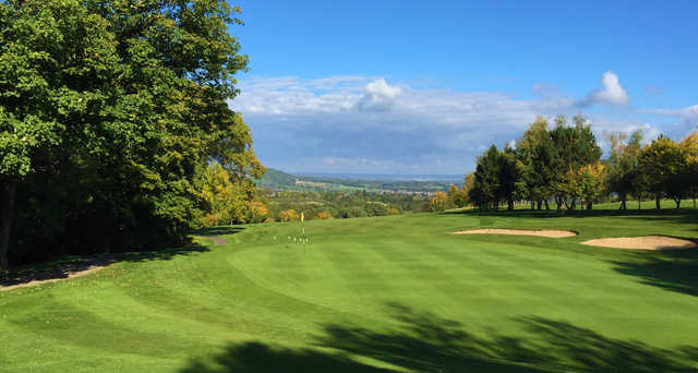 A sunny day view of a hole at Wharton Park Golf Club.