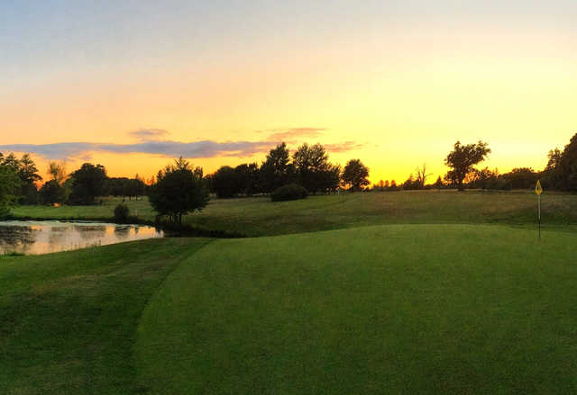 A sunset view of a hole at Billingbear Park Golf Club.