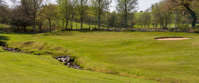 A spring day view of a hole at Colvend Golf Club.