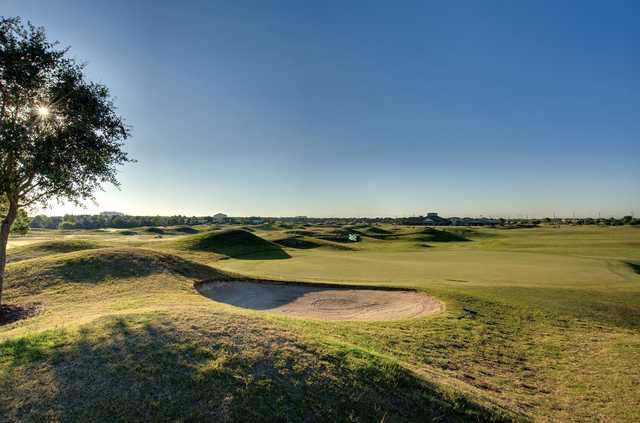 A sunny day view of green #1 at Houston National Golf Club.