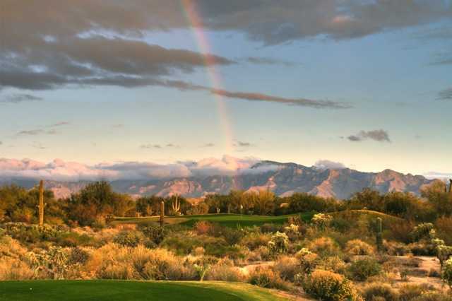 A rainbow view of the 7th green from Highlands at Dove Mountain