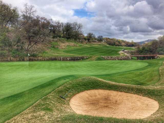 The par-4 3rd hole requires a carry over water to the green at Austin Country Club. 