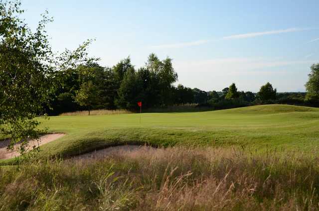 A sunny day view of a hole at Wigan Golf Club.