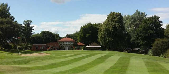 A view of a green and the clubhouse in background at Gosforth Golf Club.